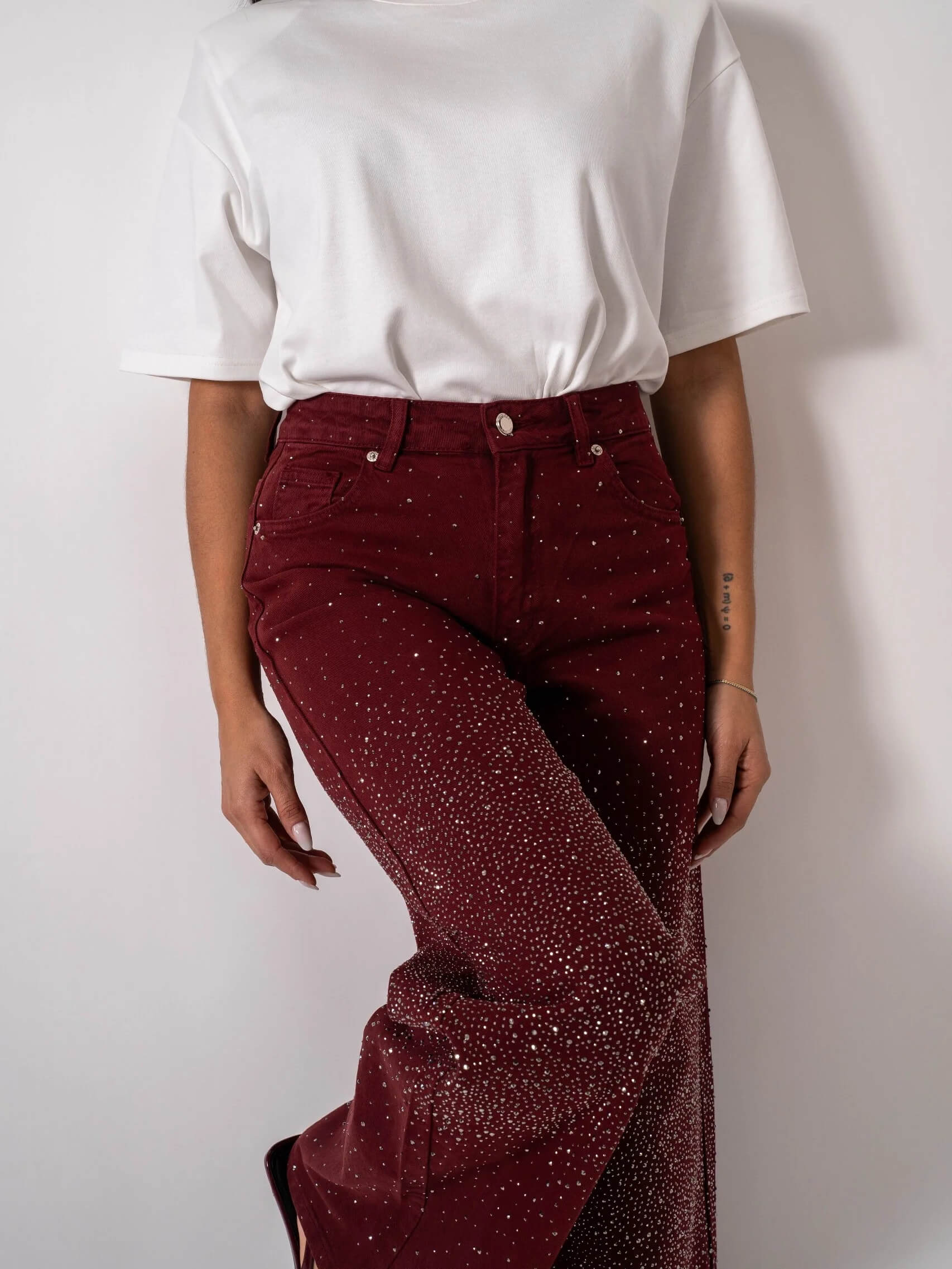 Jeans in denim glitter bordeaux